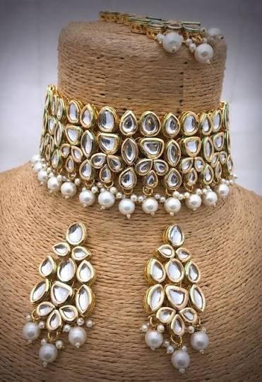 Traditional Kundan choker necklace set with earrings and maang tikka from Rajasthan