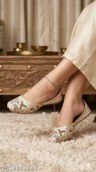 Hand-stitched Rajasthani mojari juttis with mirror and thread embroidery